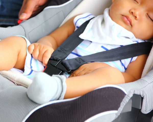 baby flying with car seat
